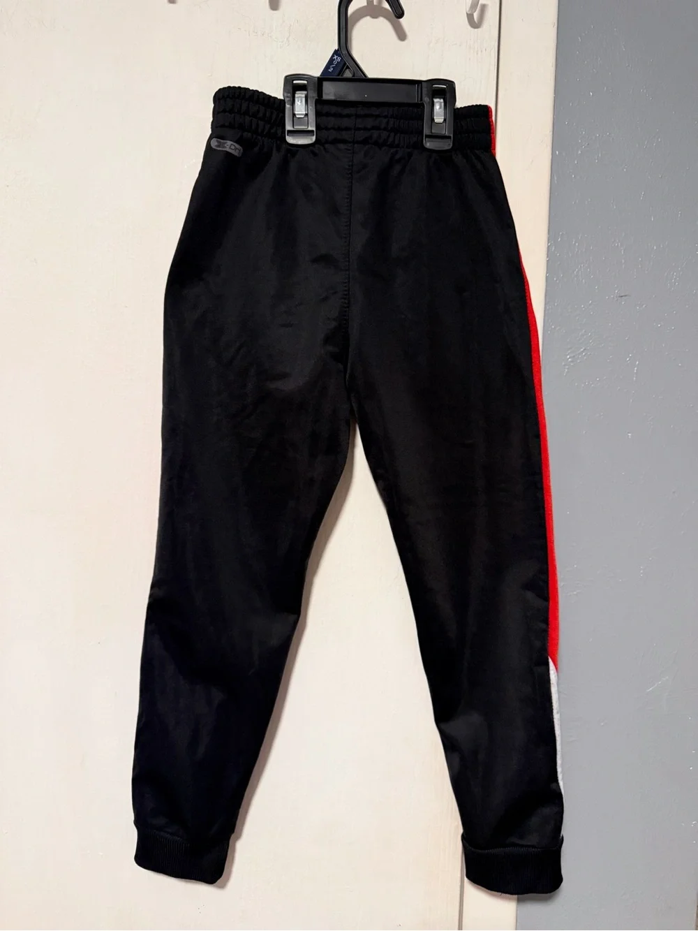 Kids RBX Black Joggers with Red Side Panels and White Accents